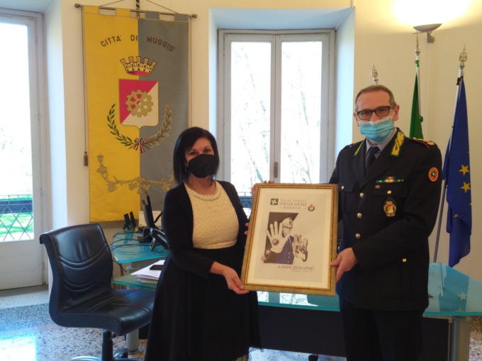 In un quadro il sacrificio della Polizia locale di Muggiò contro il Covid 19